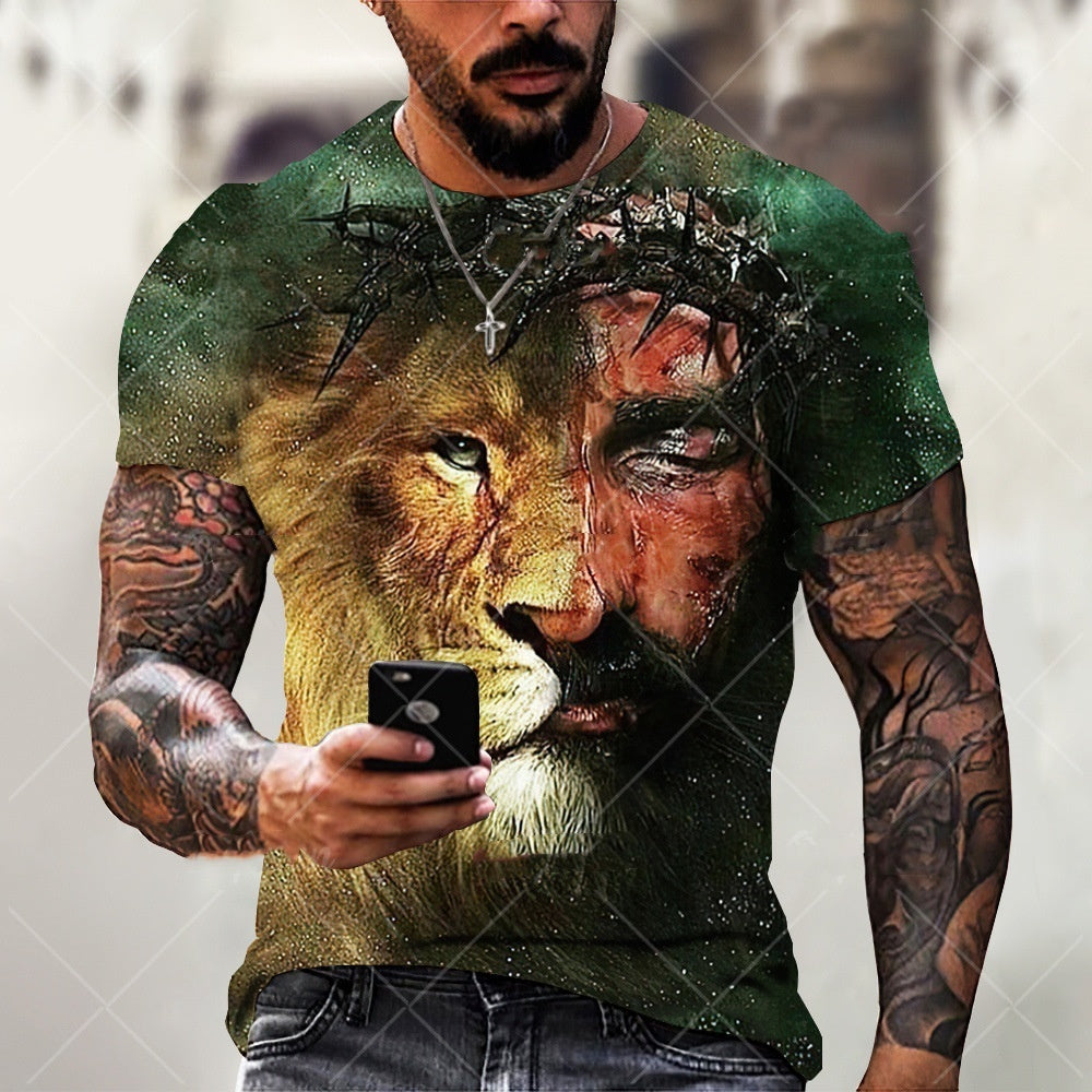 Person wearing a t-shirt with a graphic design of a lion and human face, holding a phone.