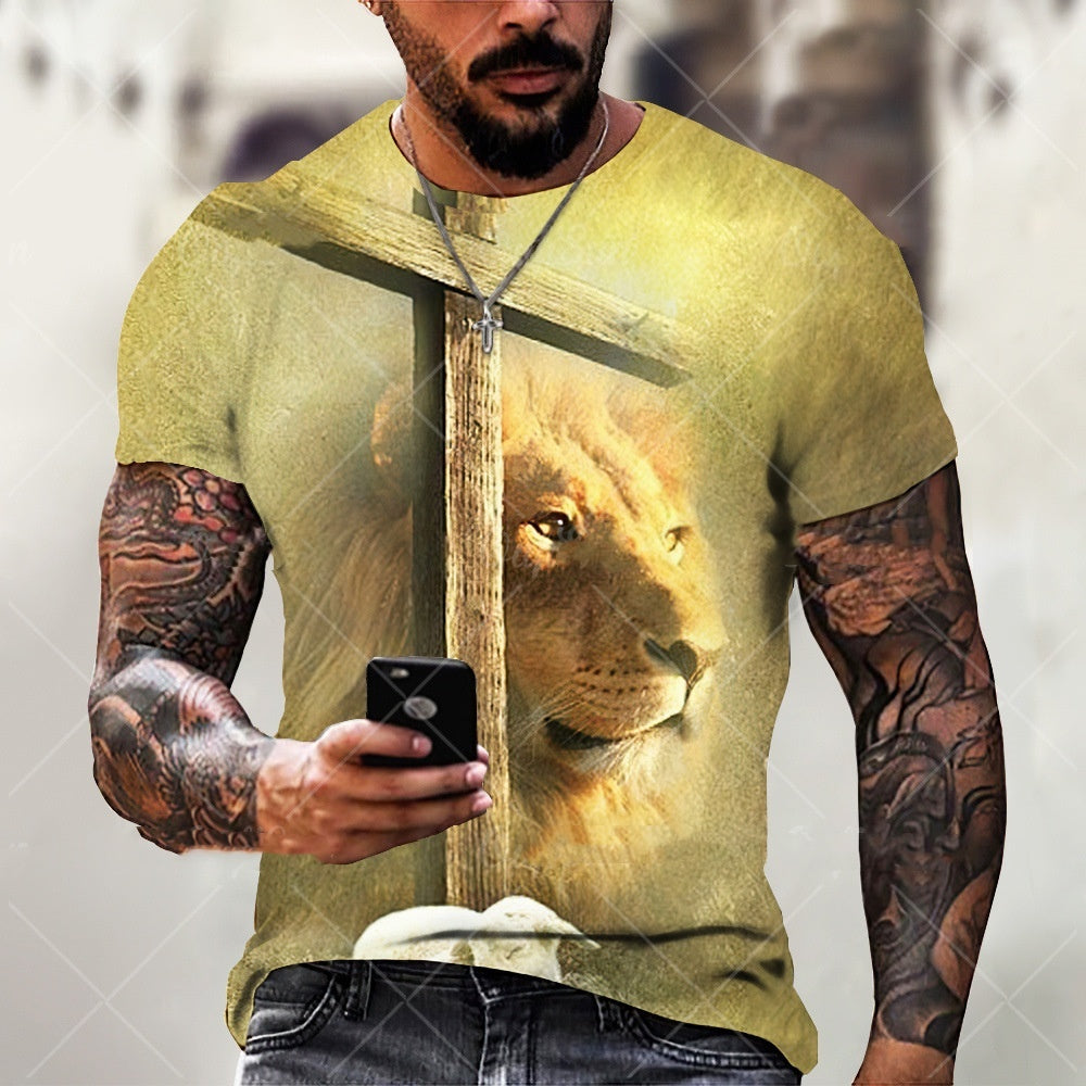 Man wearing a t-shirt with a lion graphic design, holding a phone.