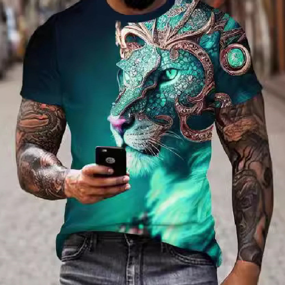 Person wearing a t-shirt with a colorful lion design, holding a phone.