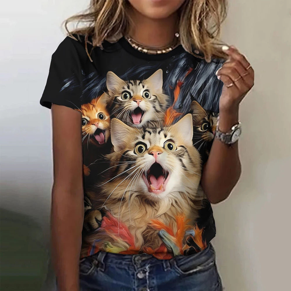 Person wearing a black t-shirt with colorful cat graphics