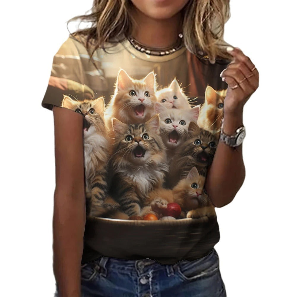 Person wearing a t-shirt with a design of kittens in a bowl.