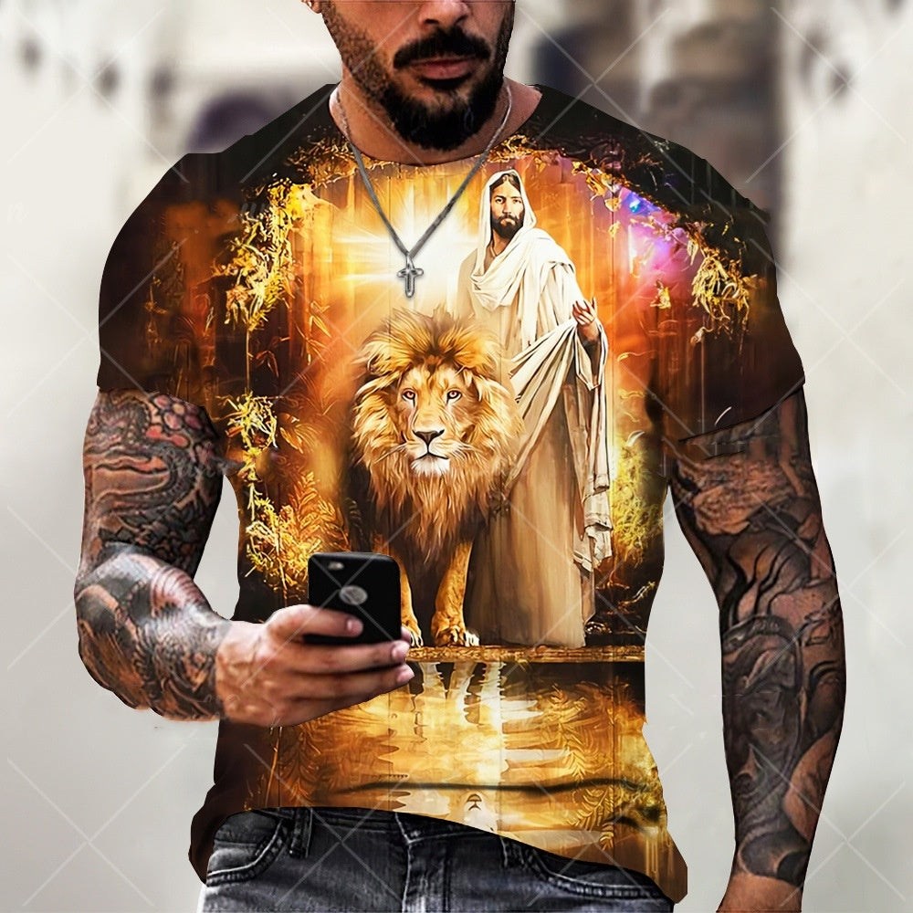 Man wearing a t-shirt with a graphic design of a lion and a robed figure, holding a phone.