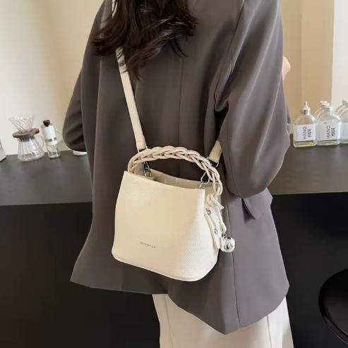 Sol Invictus Korean style woven bucket bag in litchi pattern PU leather