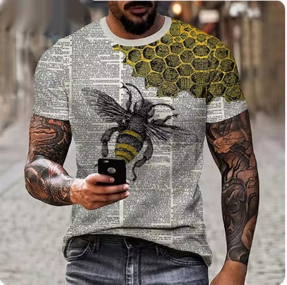 Person wearing a shirt with a bee and honeycomb design, holding a phone.
