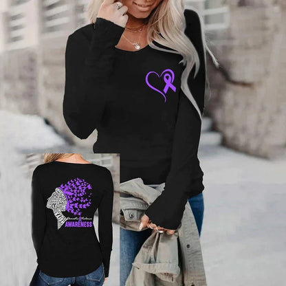 Black sweatshirt with purple heart and butterfly design worn by a person outdoors.