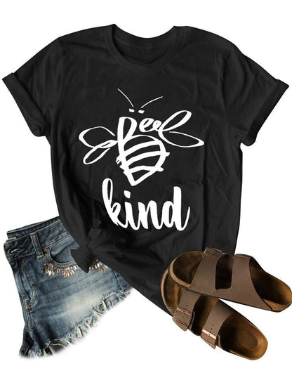 Black t-shirt with 'Be kind' design, paired with denim shorts and sandals on a white background